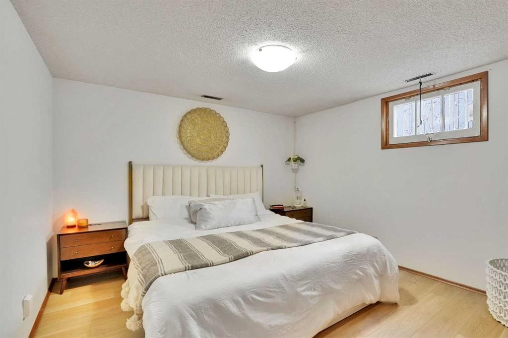 36 Malibou Road Sw, Calgary, AB - Indoor Photo Showing Bedroom