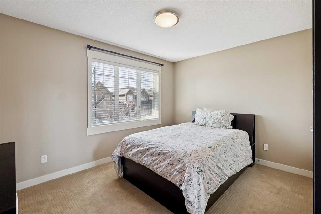 44 Aspen Summit Drive Sw, Calgary, AB - Indoor Photo Showing Bedroom