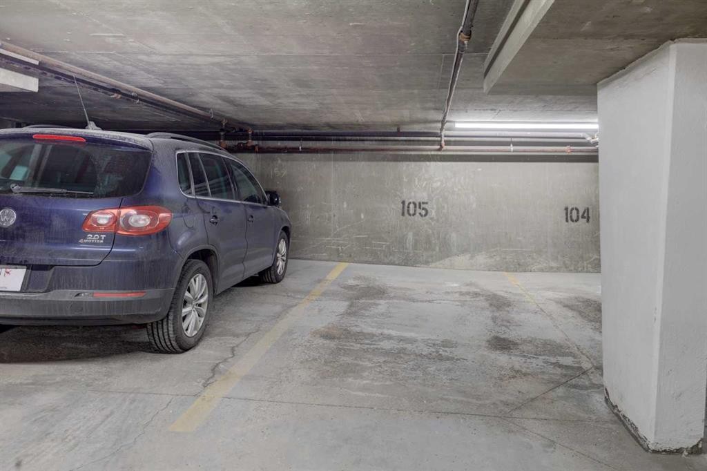 101-6800 Hunterview Drive Nw, Calgary, AB - Indoor Photo Showing Garage