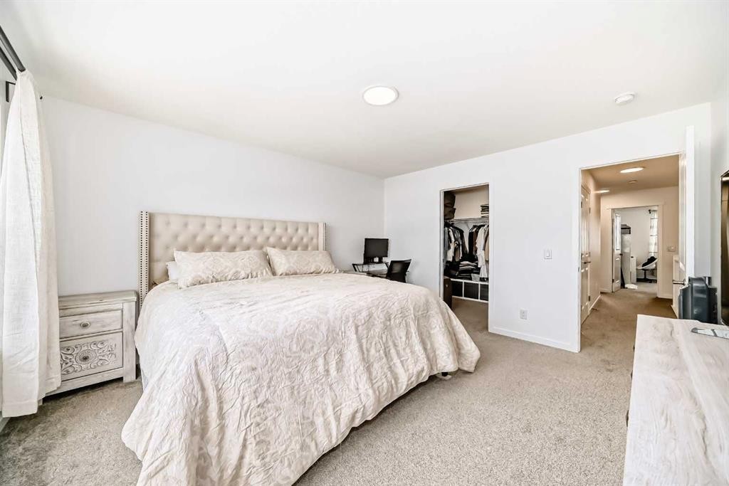 355 Masters Row Se, Calgary, AB - Indoor Photo Showing Bedroom