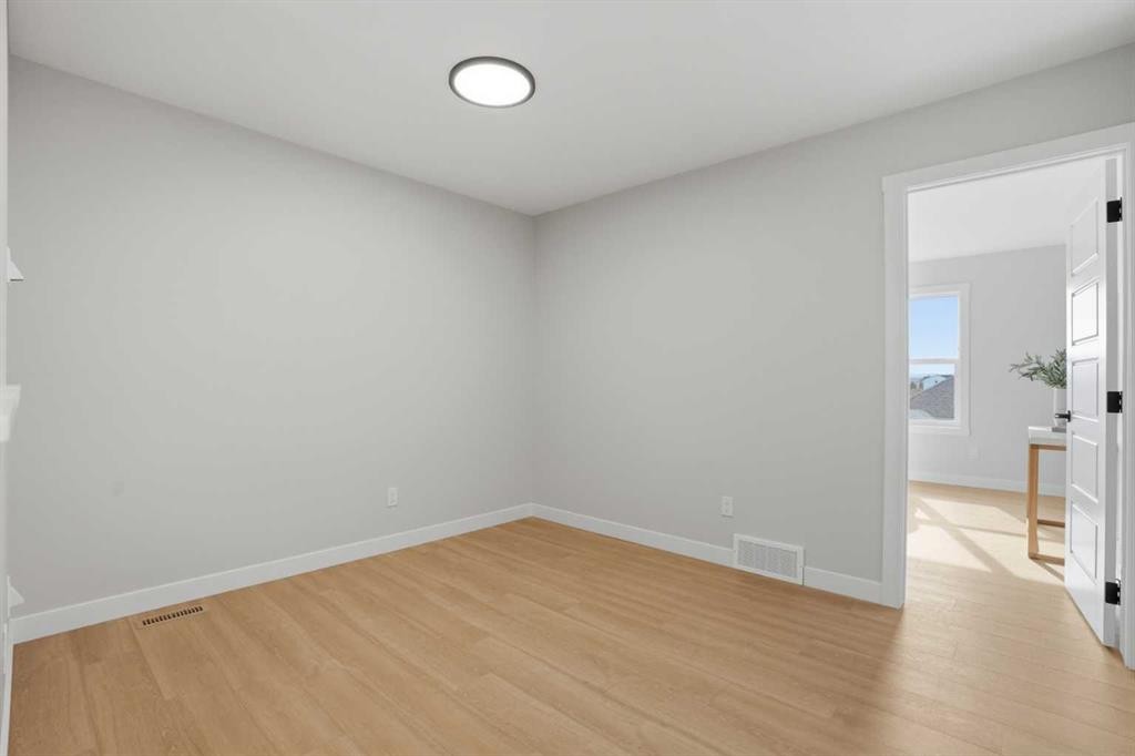 21 Wild Rose Way Se, Calgary, AB - Indoor Photo Showing Other Room