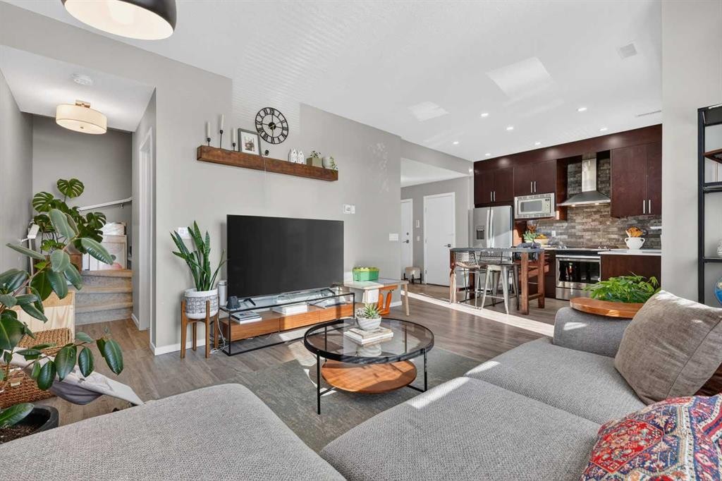 203-445 Redstone Walk Ne, Calgary, AB - Indoor Photo Showing Living Room