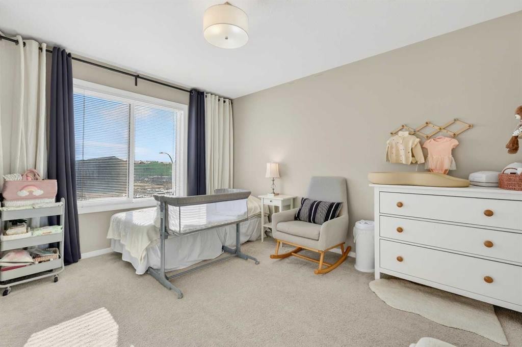 203-445 Redstone Walk Ne, Calgary, AB - Indoor Photo Showing Bedroom