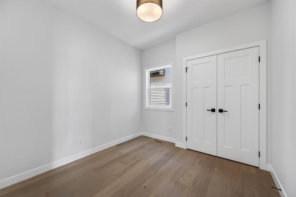 709 Dawson Common, Chestermere, AB - Indoor Photo Showing Other Room