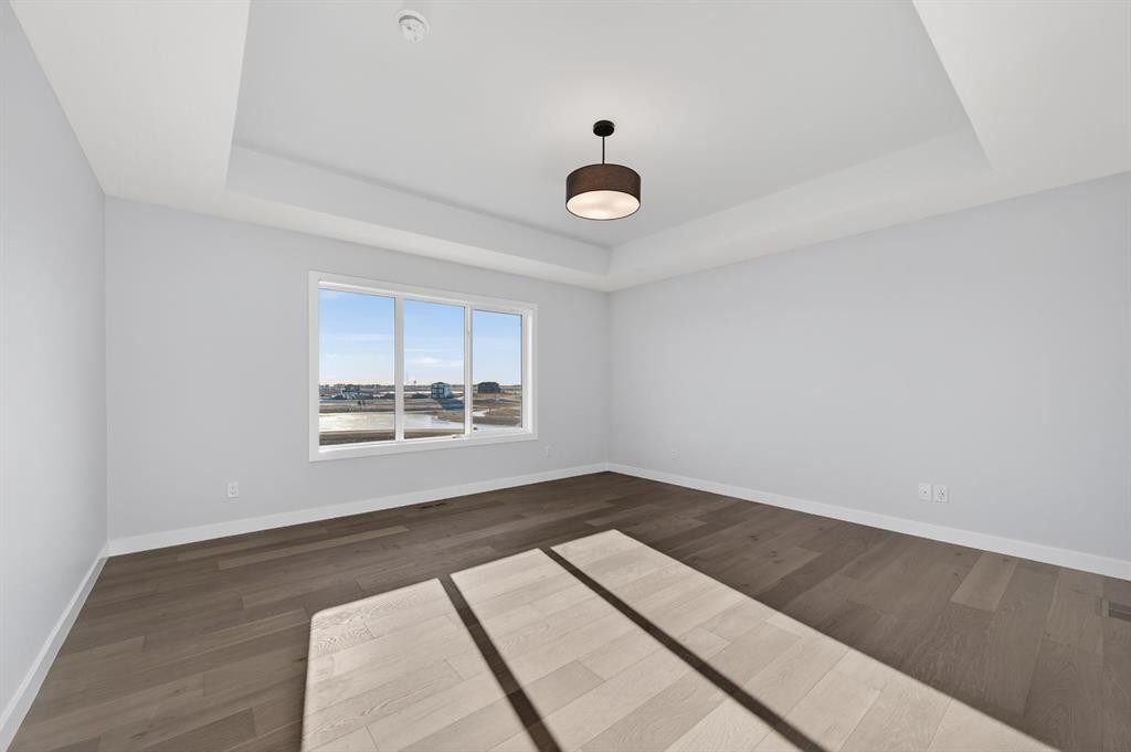 709 Dawson Common, Chestermere, AB - Indoor Photo Showing Other Room