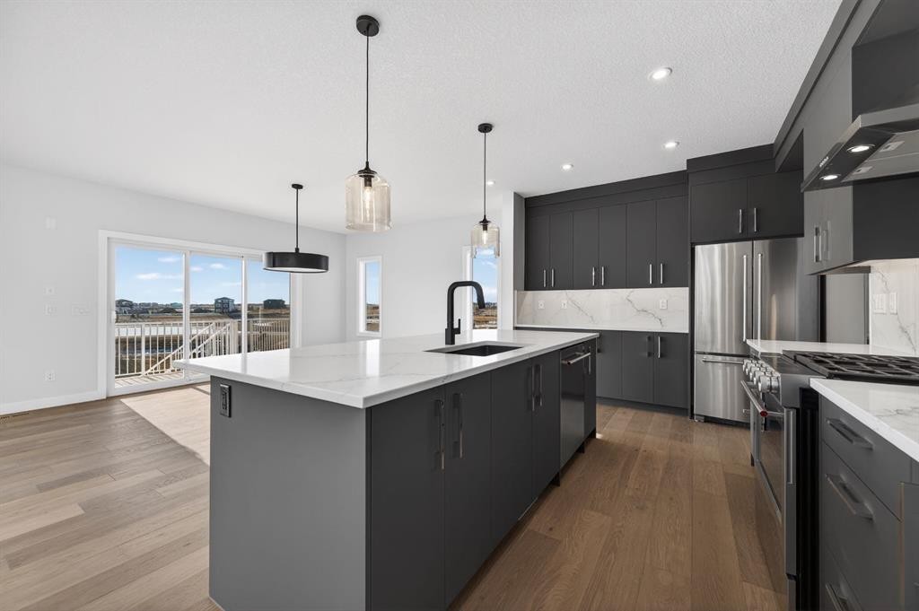 709 Dawson Common, Chestermere, AB - Indoor Photo Showing Kitchen With Upgraded Kitchen