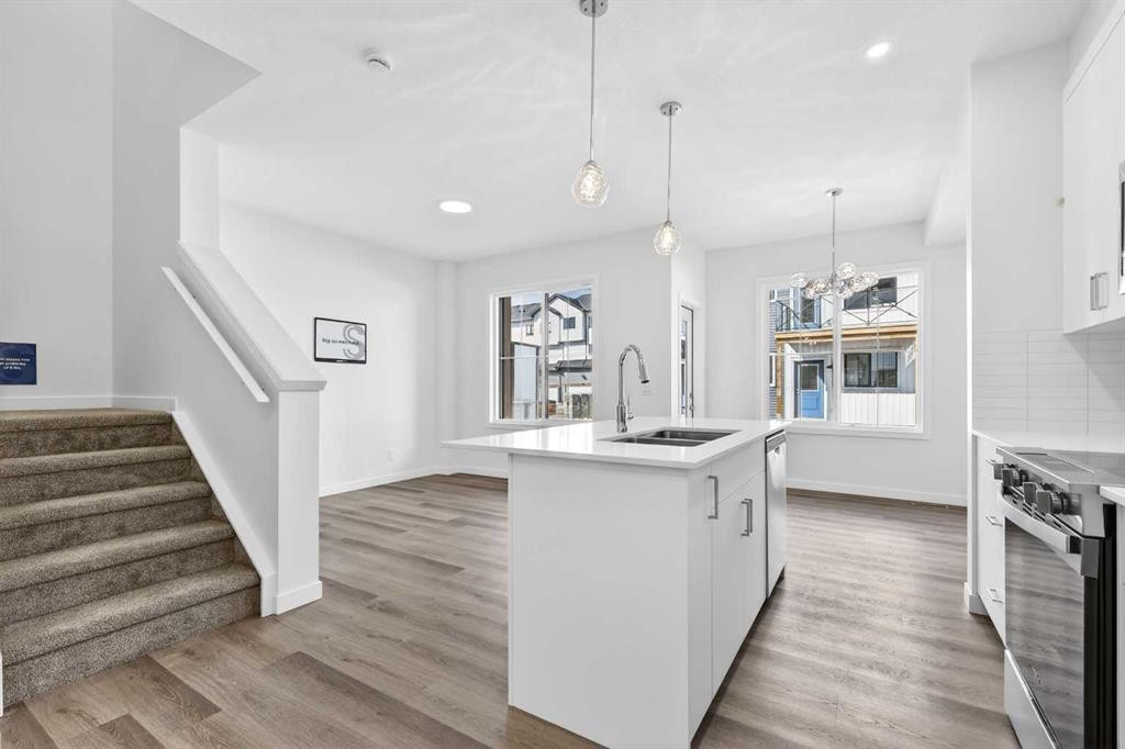 50 Creekside Way Sw, Calgary, AB - Indoor Photo Showing Kitchen With Double Sink With Upgraded Kitchen