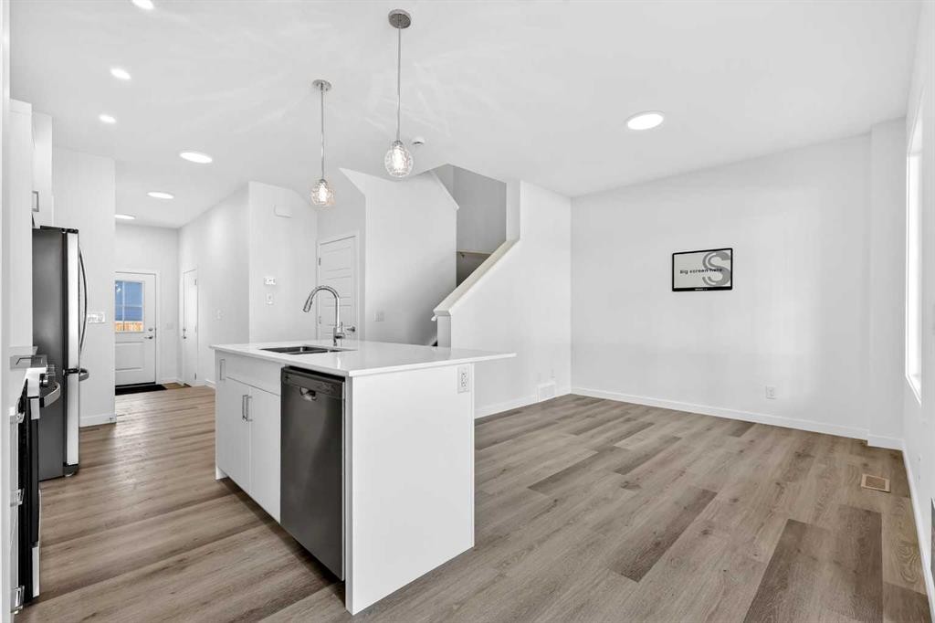 50 Creekside Way Sw, Calgary, AB - Indoor Photo Showing Kitchen With Upgraded Kitchen