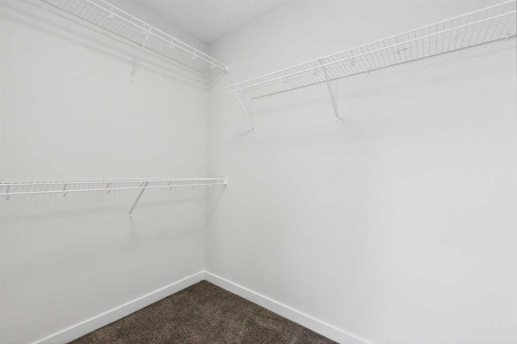50 Creekside Way Sw, Calgary, AB - Indoor With Storage