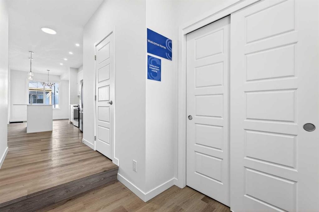 50 Creekside Way Sw, Calgary, AB - Indoor Photo Showing Other Room