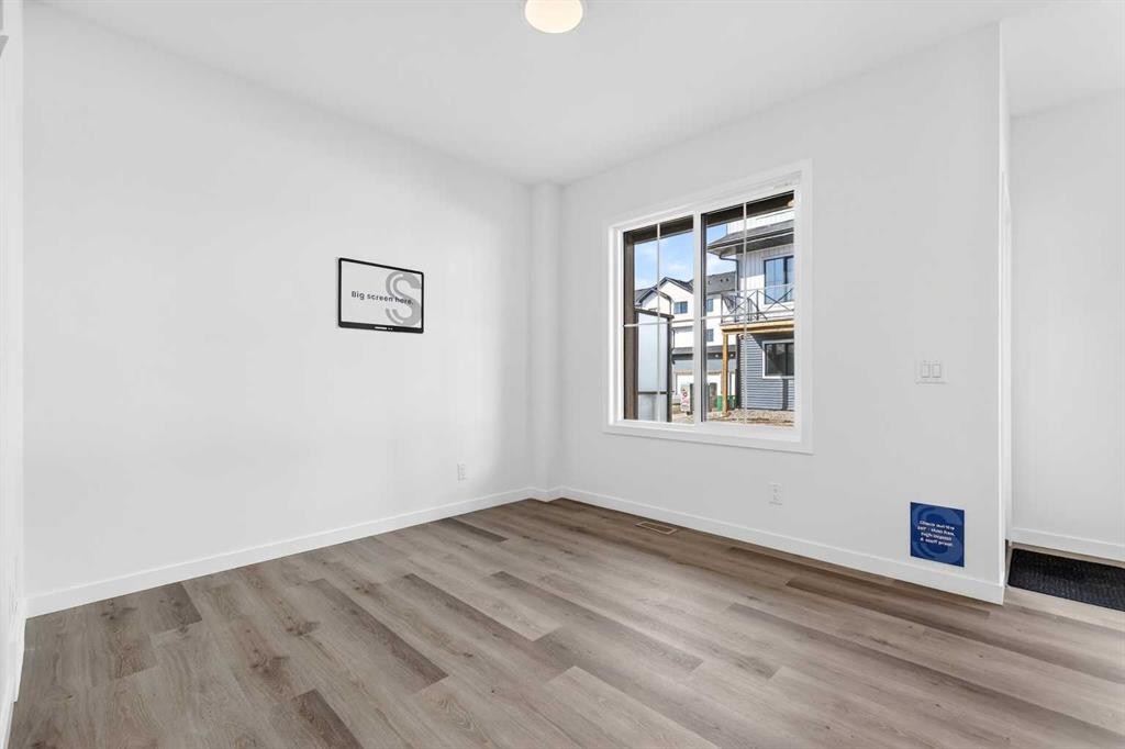 50 Creekside Way Sw, Calgary, AB - Indoor Photo Showing Other Room