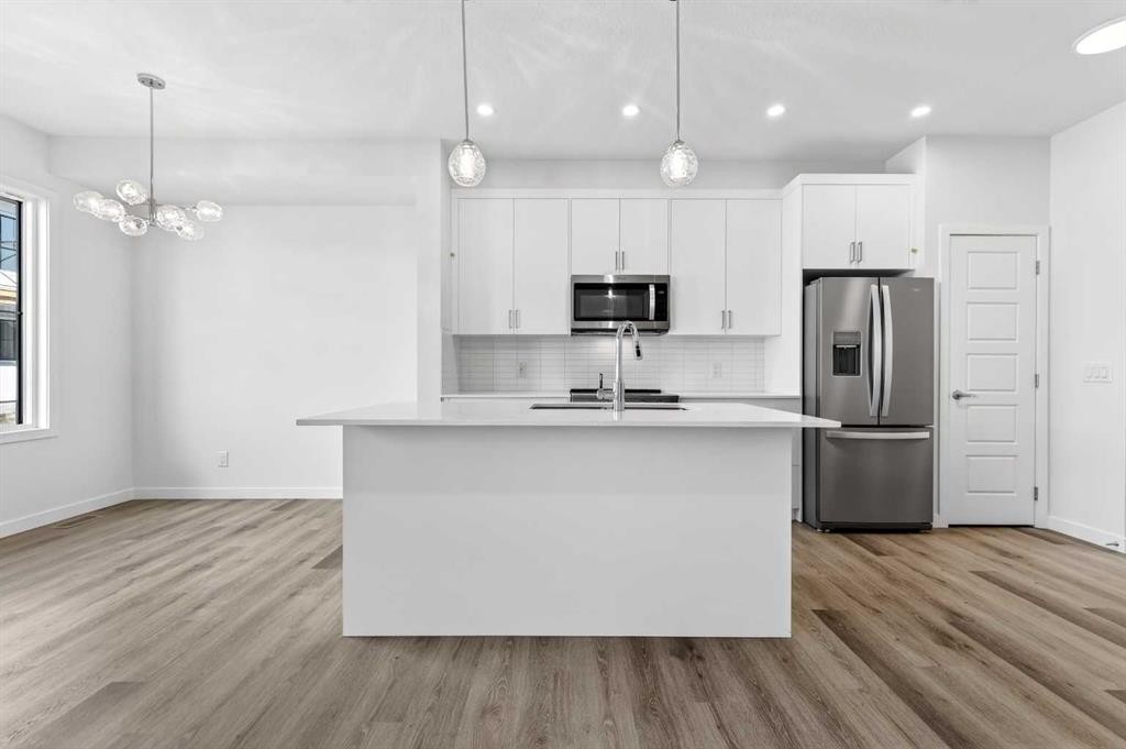 50 Creekside Way Sw, Calgary, AB - Indoor Photo Showing Kitchen With Stainless Steel Kitchen With Upgraded Kitchen