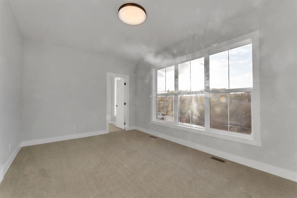 28 Spring Creek Point Sw, Calgary, AB - Indoor Photo Showing Other Room