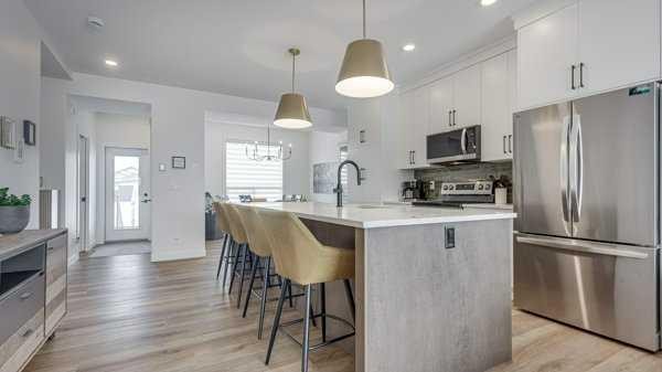 B-10 Evergreen Way, Red Deer, AB - Indoor Photo Showing Kitchen With Upgraded Kitchen