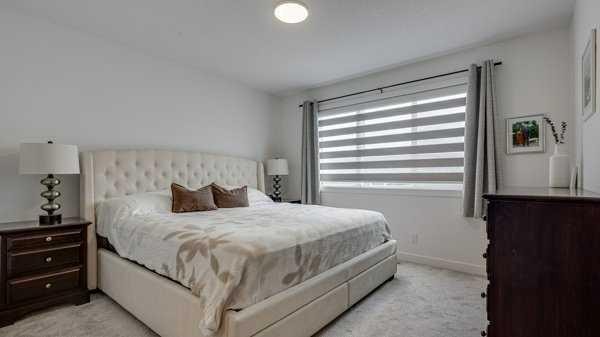 B-10 Evergreen Way, Red Deer, AB - Indoor Photo Showing Bedroom