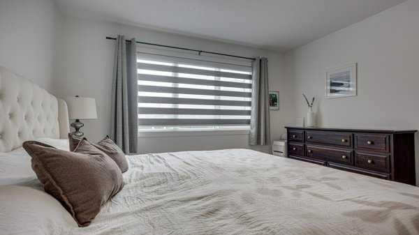 B-10 Evergreen Way, Red Deer, AB - Indoor Photo Showing Bedroom