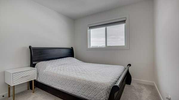 B-10 Evergreen Way, Red Deer, AB - Indoor Photo Showing Bedroom