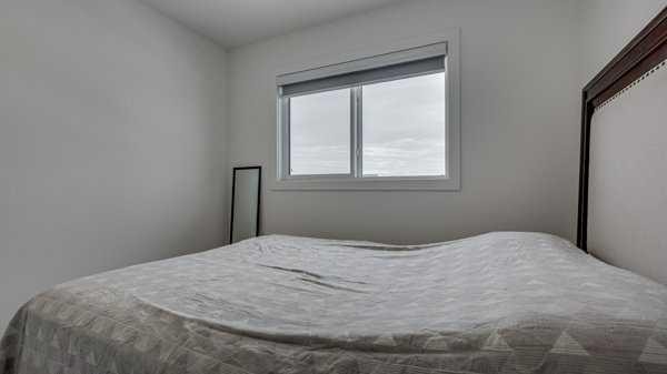 B-10 Evergreen Way, Red Deer, AB - Indoor Photo Showing Bedroom