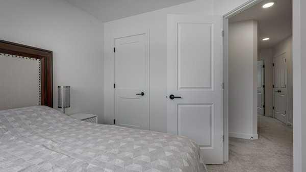 B-10 Evergreen Way, Red Deer, AB - Indoor Photo Showing Bedroom