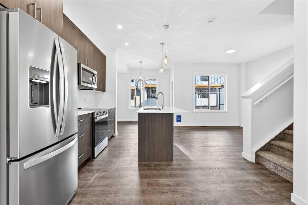 54 Creekside Way Sw, Calgary, AB - Indoor Photo Showing Kitchen With Stainless Steel Kitchen With Upgraded Kitchen