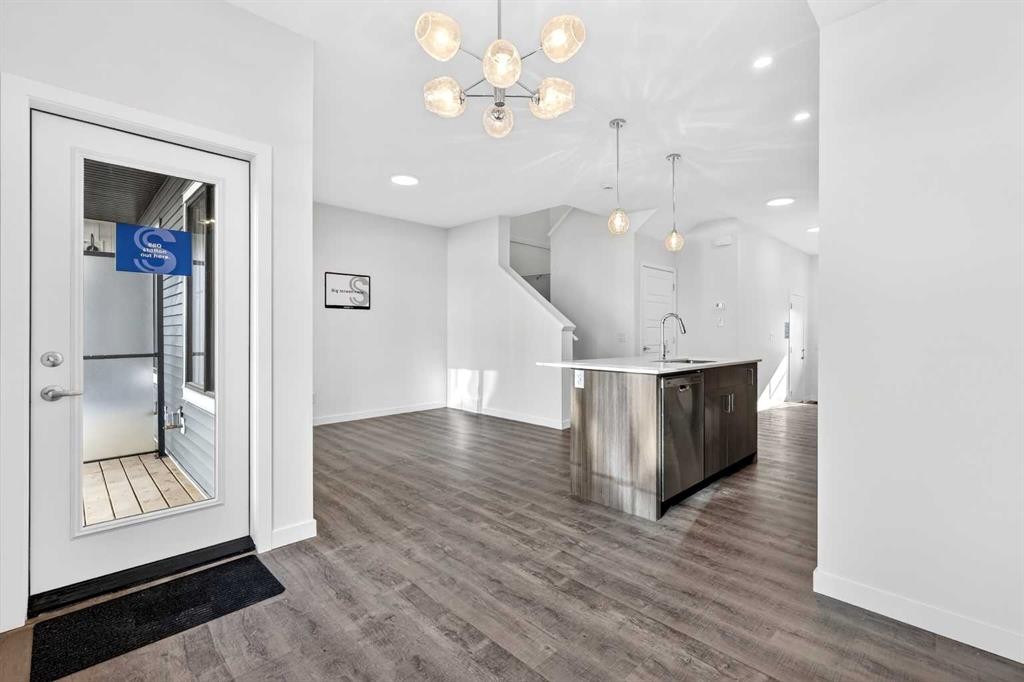 54 Creekside Way Sw, Calgary, AB - Indoor Photo Showing Other Room