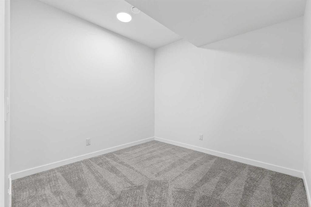 54 Creekside Way Sw, Calgary, AB - Indoor Photo Showing Other Room