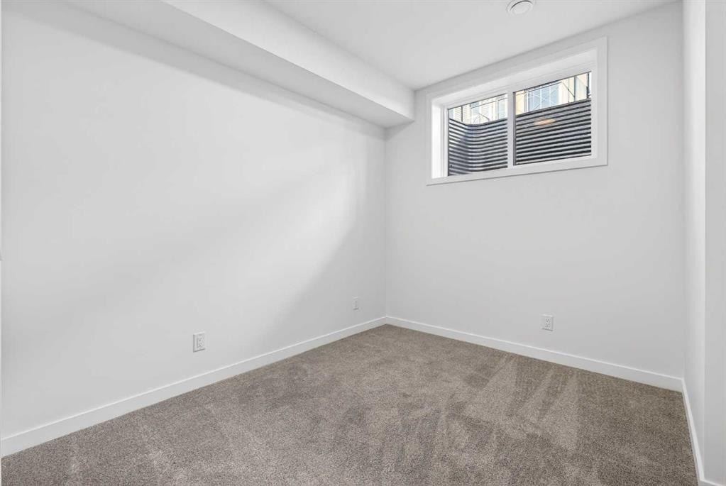 54 Creekside Way Sw, Calgary, AB - Indoor Photo Showing Other Room