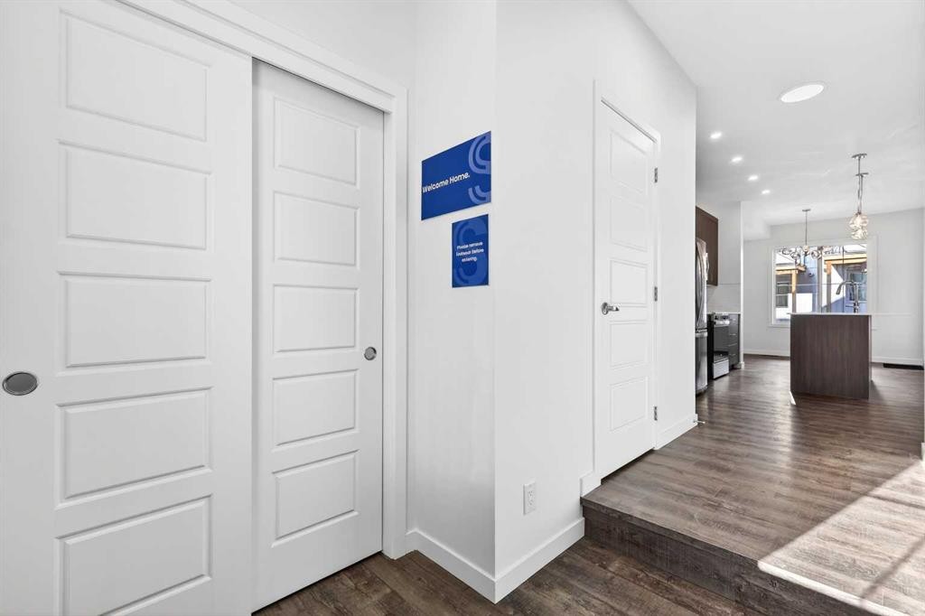 54 Creekside Way Sw, Calgary, AB - Indoor Photo Showing Other Room