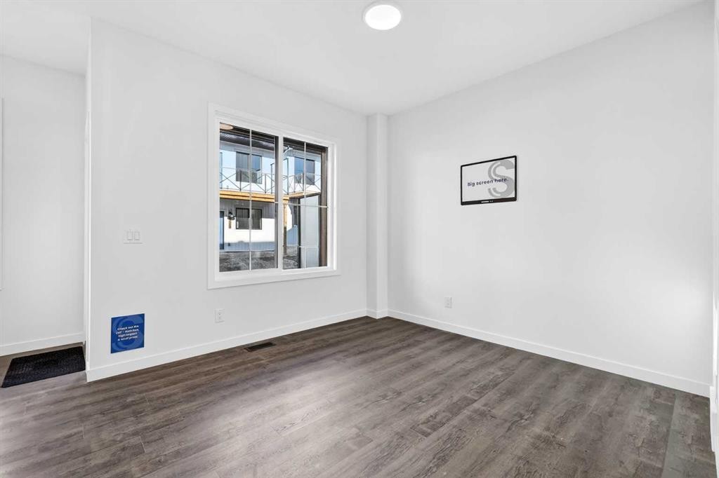 54 Creekside Way Sw, Calgary, AB - Indoor Photo Showing Other Room