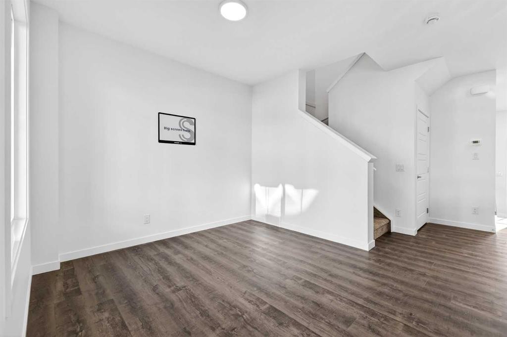 54 Creekside Way Sw, Calgary, AB - Indoor Photo Showing Other Room