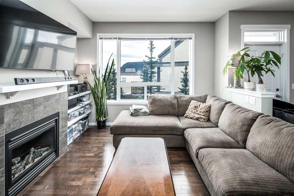 159 Kincora Heath Nw, Calgary, AB - Indoor Photo Showing Living Room With Fireplace