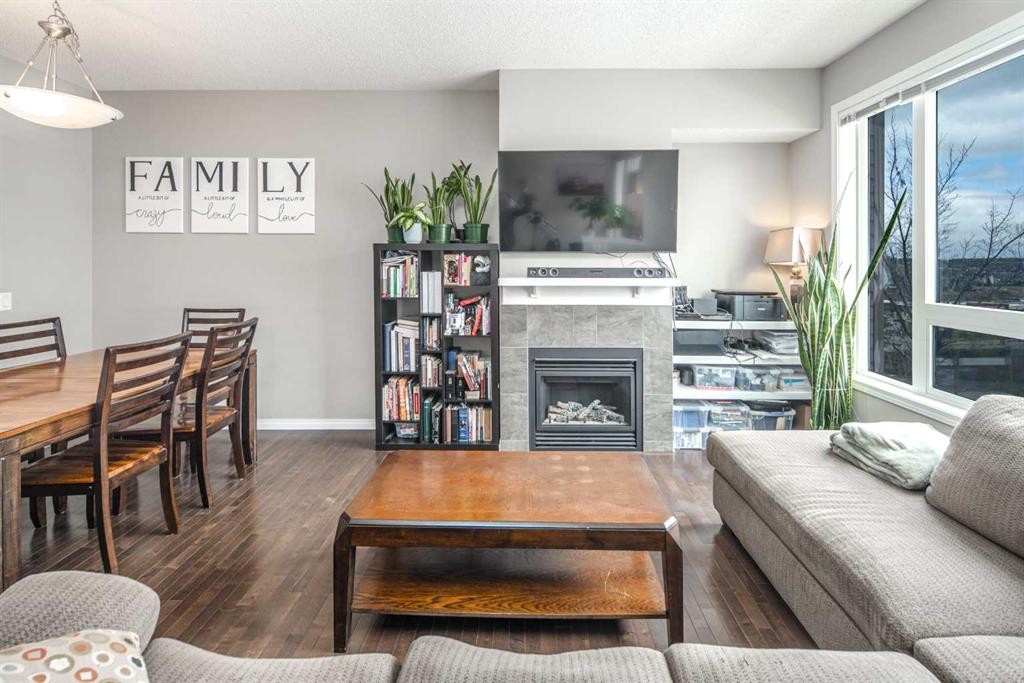 159 Kincora Heath Nw, Calgary, AB - Indoor Photo Showing Living Room With Fireplace