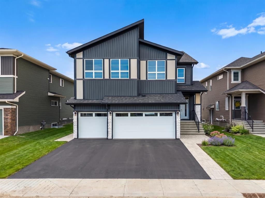 83 Dawson Wharf Mount, Chestermere, AB - Outdoor With Facade