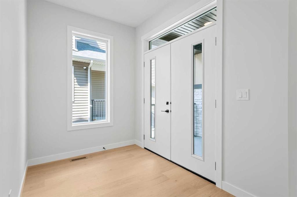 83 Dawson Wharf Mount, Chestermere, AB - Indoor Photo Showing Other Room