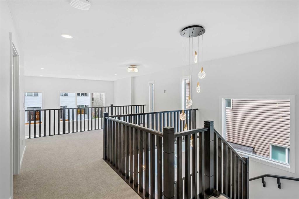 83 Dawson Wharf Mount, Chestermere, AB - Indoor Photo Showing Other Room