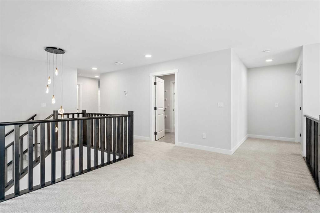 83 Dawson Wharf Mount, Chestermere, AB - Indoor Photo Showing Other Room