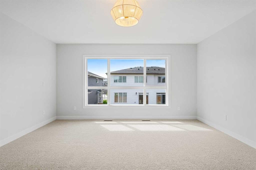 83 Dawson Wharf Mount, Chestermere, AB - Indoor Photo Showing Other Room