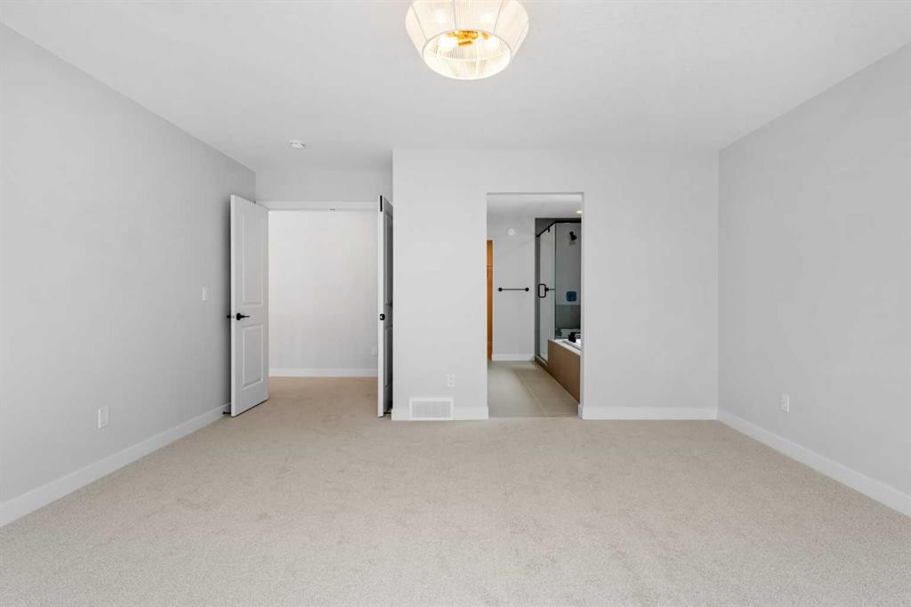 83 Dawson Wharf Mount, Chestermere, AB - Indoor Photo Showing Other Room