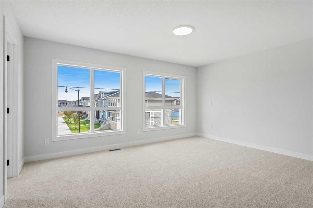 83 Dawson Wharf Mount, Chestermere, AB - Indoor Photo Showing Other Room