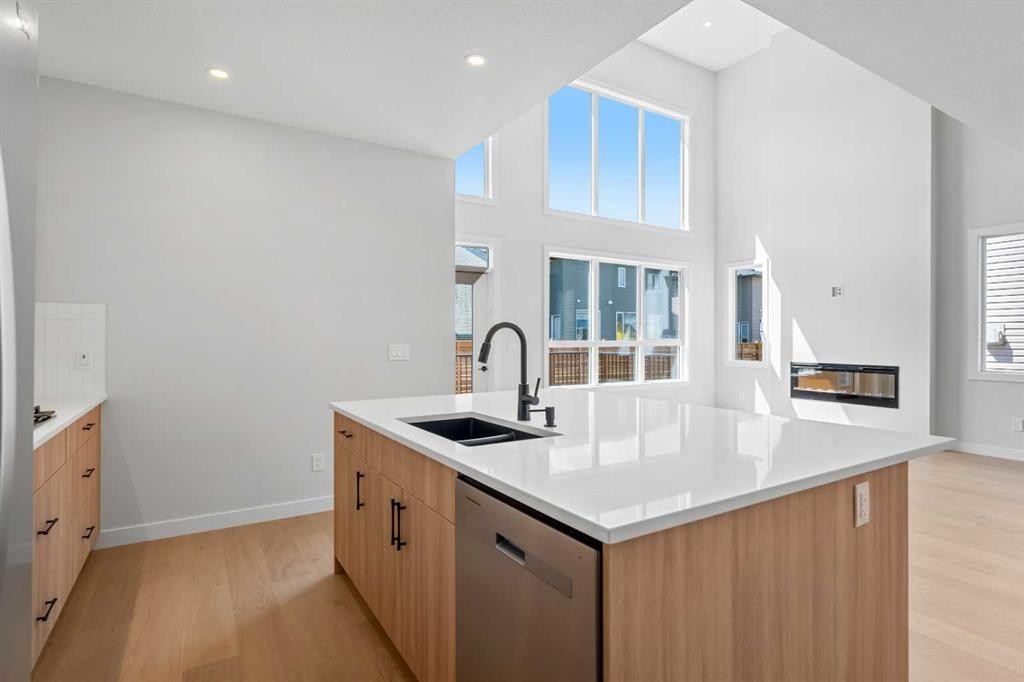 83 Dawson Wharf Mount, Chestermere, AB - Indoor Photo Showing Kitchen With Double Sink
