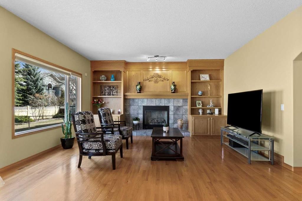 123 Schiller Crescent Nw, Calgary, AB - Indoor Photo Showing Living Room With Fireplace