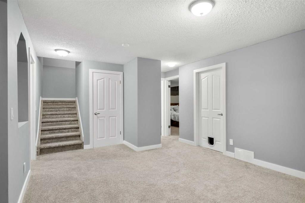 176 Douglas Ridge Green Se, Calgary, AB - Indoor Photo Showing Other Room