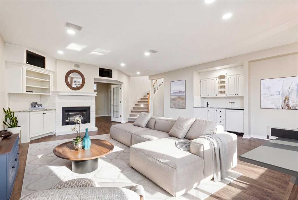 1656 Evergreen Hill Sw, Calgary, AB - Indoor Photo Showing Living Room With Fireplace