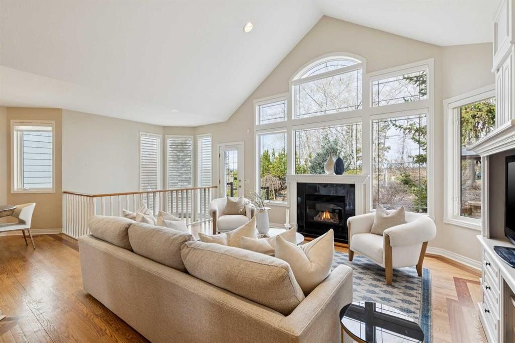 1656 Evergreen Hill Sw, Calgary, AB - Indoor Photo Showing Living Room With Fireplace