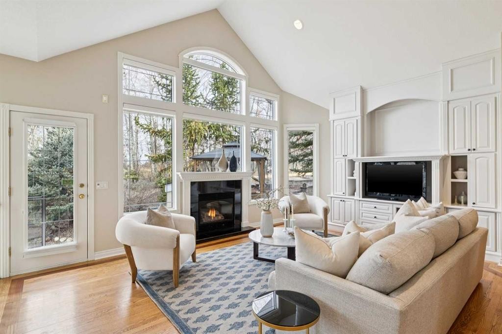 1656 Evergreen Hill Sw, Calgary, AB - Indoor Photo Showing Living Room With Fireplace