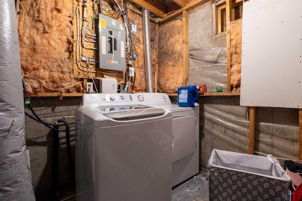 136 Martindale Drive Ne, Calgary, AB - Indoor Photo Showing Laundry Room