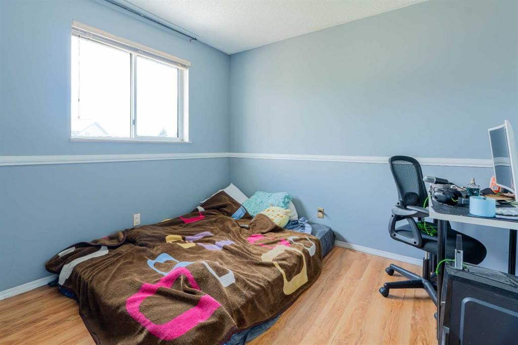 136 Martindale Drive Ne, Calgary, AB - Indoor Photo Showing Bedroom