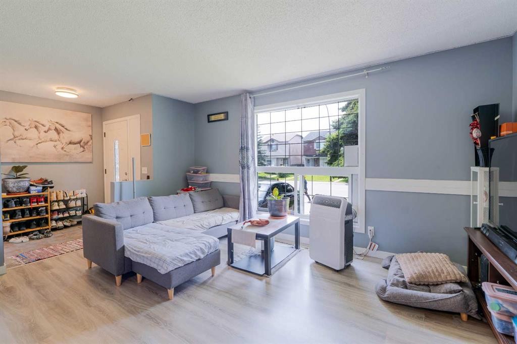 136 Martindale Drive Ne, Calgary, AB - Indoor Photo Showing Living Room