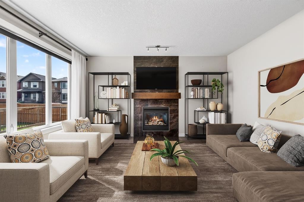 31 Evansridge Close Nw, Calgary, AB - Indoor Photo Showing Living Room With Fireplace