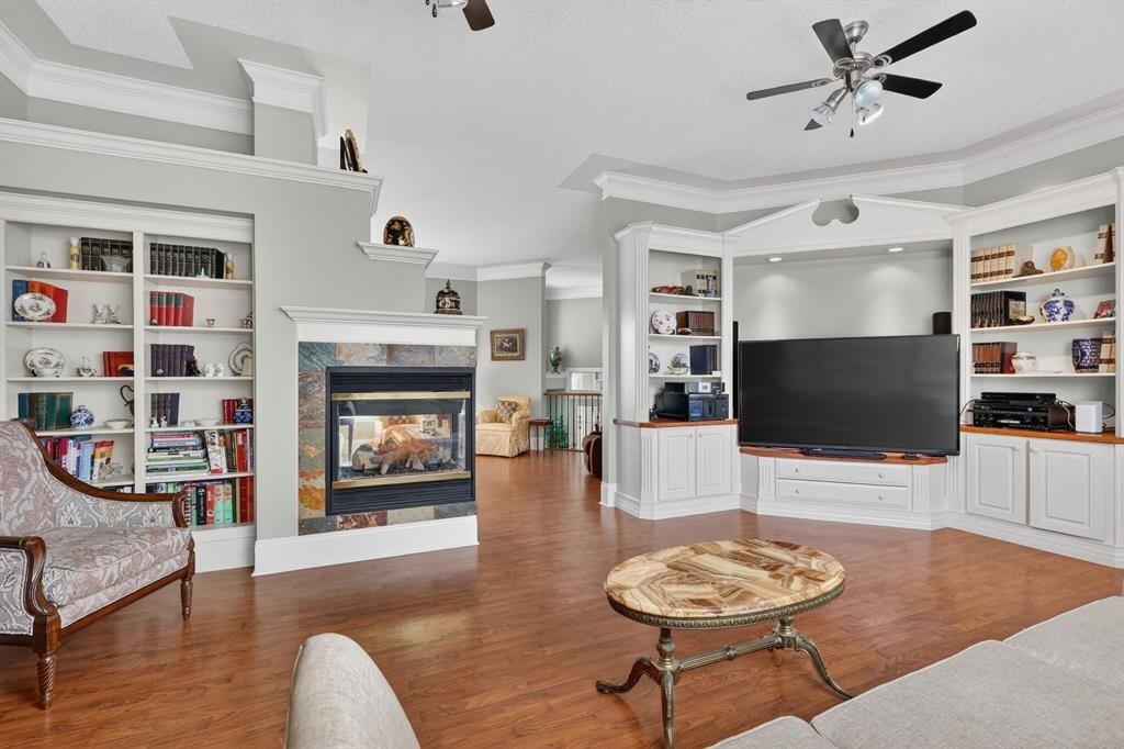331 Mt Douglas Court Se, Calgary, AB - Indoor Photo Showing Living Room With Fireplace